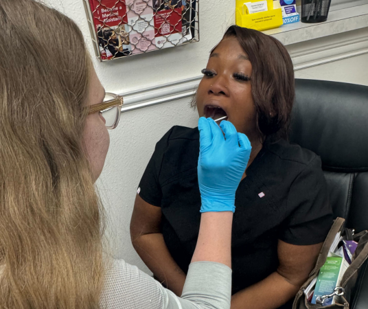 Medical assistant student training at Gonzales Medical Assistant School