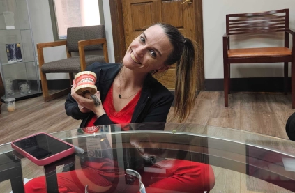 Close-up of student preparing material for a temporary crown in a Waco DAS clinical lab