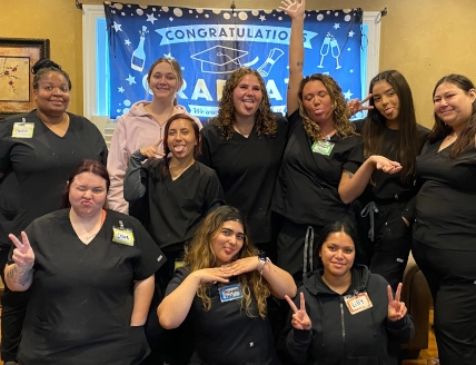  Group of Dental Assistant graduates and instructors at Tulsa Dental Assistant School celebrating program completion. 