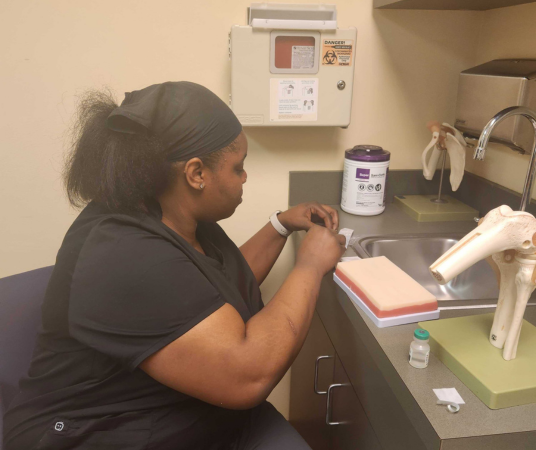 Medical assistant student training at Gonzales Medical Assistant School