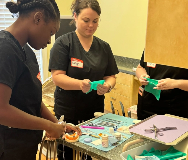 Dental assistant student training at Grand Rapids Dental Assistant School