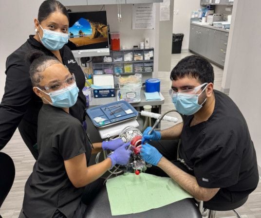 Dental assistant student training at Provo Dental Assistant School