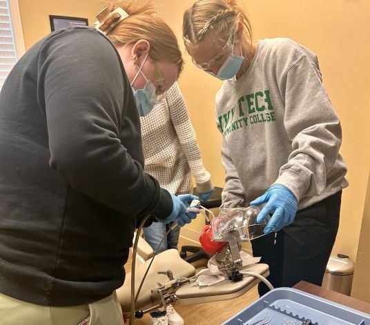 Dental assistant student training at Provo Dental Assistant School