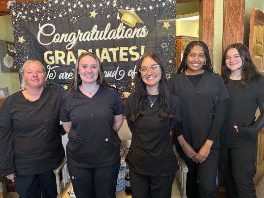 Dental assistant student training at Louisville Dental Assistant School