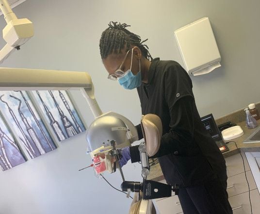 Dental assistant student training at San Antonio Dental Assistant School