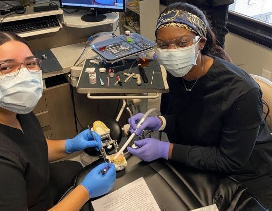 Dental assistant student training at Bowling Green Dental Assistant School