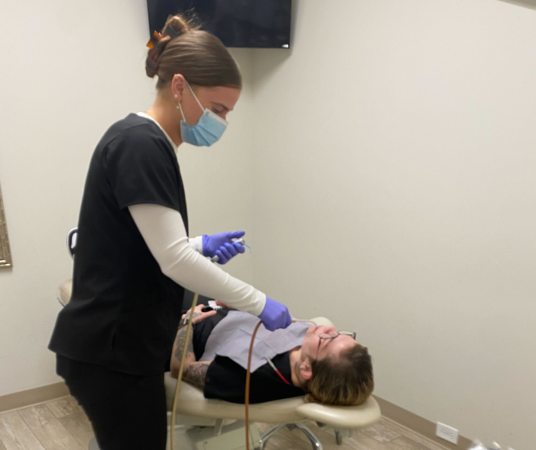 Dental assistant student training at Olympia Dental Assistant School