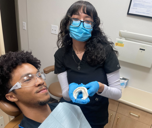 Dental assistant student training at Provo Dental Assistant School