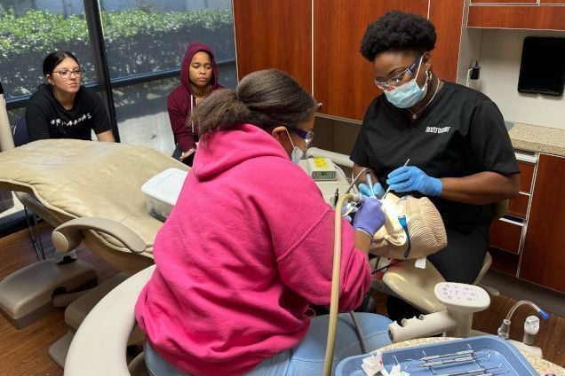 Dental assistant student training at College Station Dental Assistant School