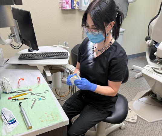 Dental assistant student training at Tacoma Dental Assistant School