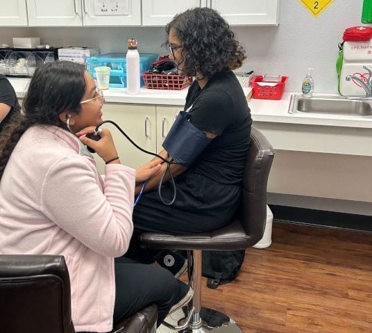 Medical assistant student training at Gonzales Medical Assistant School