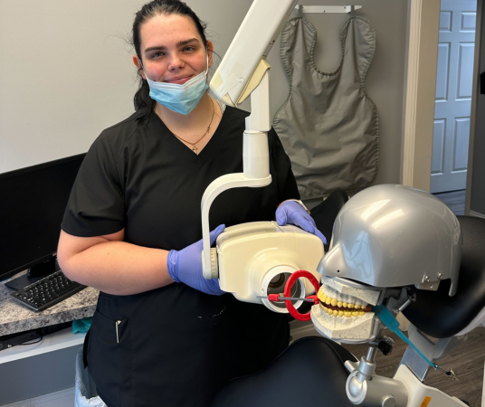 Dental assistant student training at Dallas Dental Assistant School