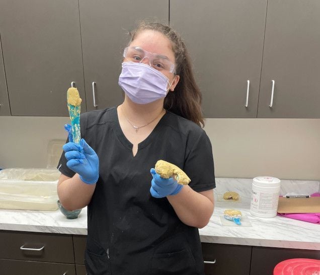 Dental assistant student training at Sterling Dental Assistant School
