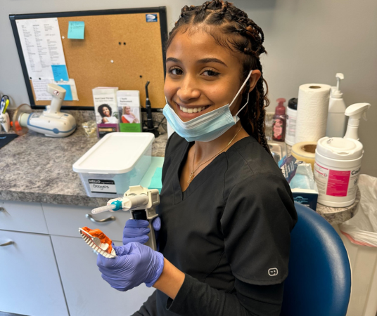 Dental assistant student training at Norfolk Dental Assistant School