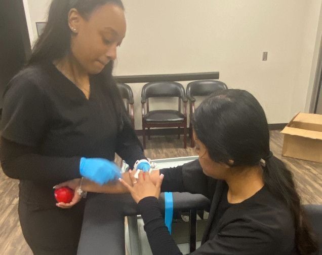 Medical assistant student training at Gonzales Medical Assistant School