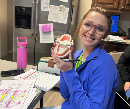 Dental assistant student training at Tacoma Dental Assistant School