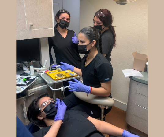 Dental assistant student training at Yuba City Dental Assistant School