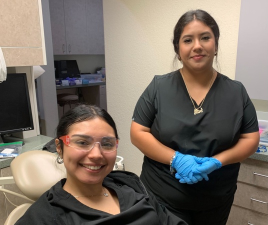 Dental assistant student training at St. George Dental Assistant School
