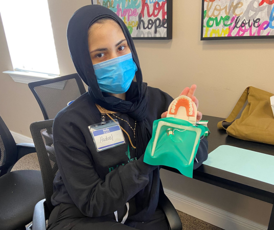 Dental assistant student training at Fort Wayne Dental Assistant School