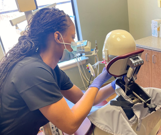Dental assistant student training at Roanoke Dental Assistant School