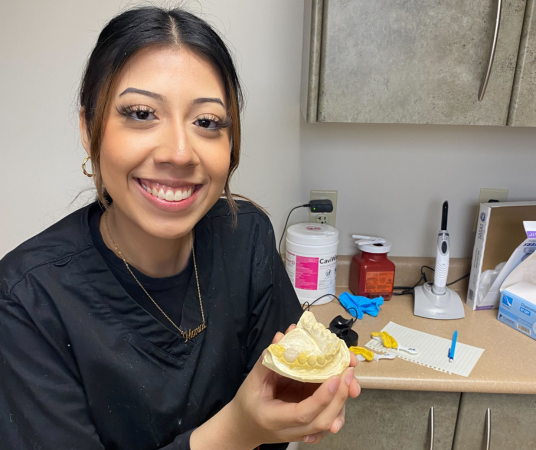 Dental assistant student training at Kokomo Dental Assistant School