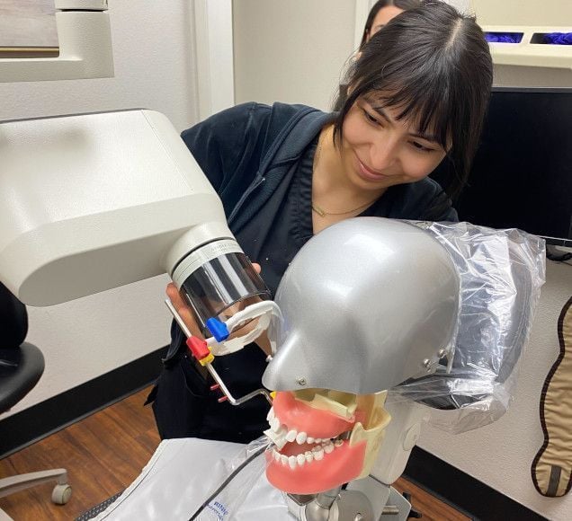 Dental assistant student training at Provo Dental Assistant School