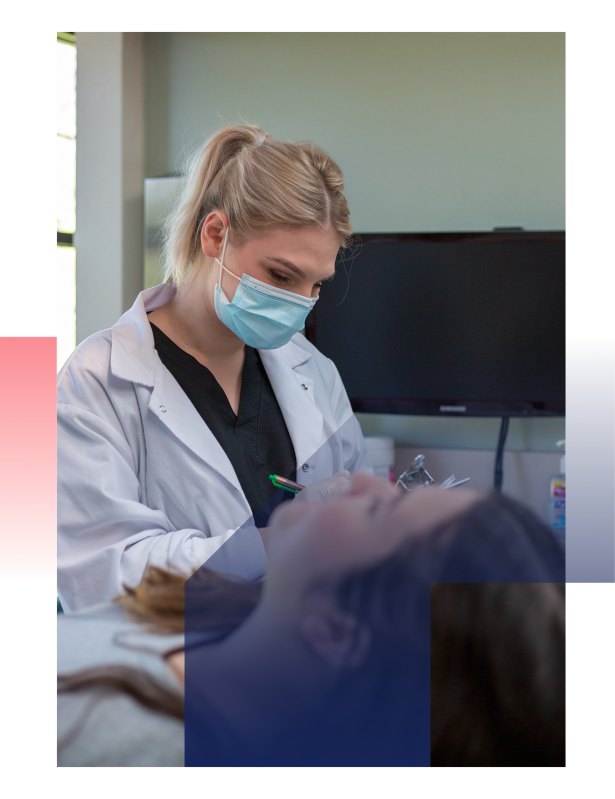 Medical assistant in training with patient