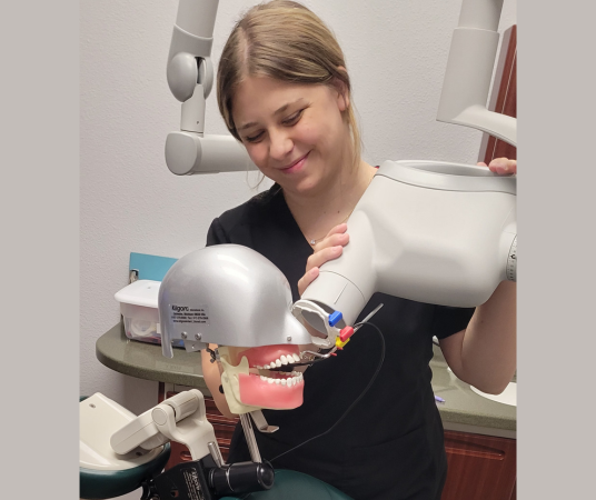Dental assistant student training at Oklahoma City Dental Assistant School
