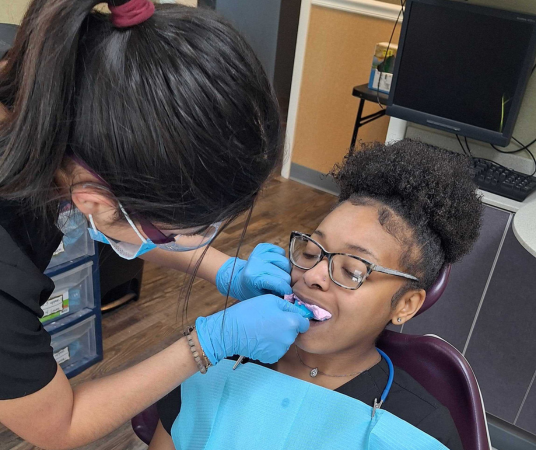 Dental assistant student training at Beaufort Dental Assistant School