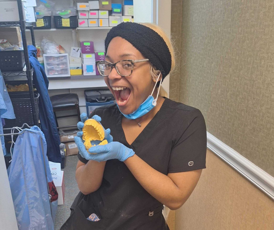 Dental assistant student training at Dallas Dental Assistant School