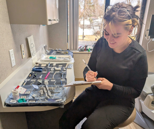 Dental assistant student training at Savannah Dental Assistant School