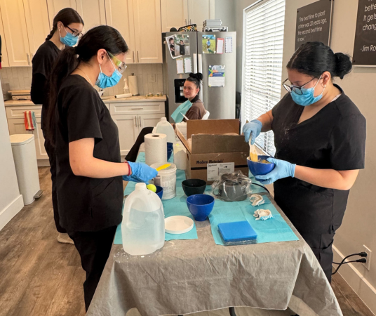 Dental assistant student training at Norfolk Dental Assistant School