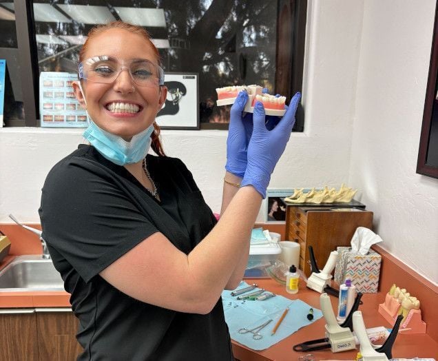 Dental assistant student training at Shreveport Dental Assistant School