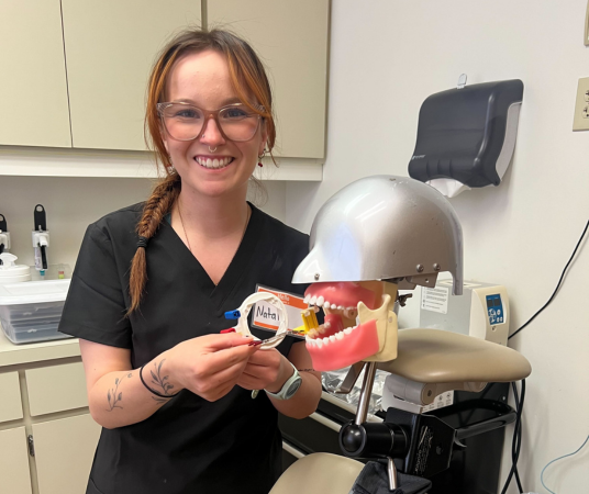 Dental assistant student training at Shreveport Dental Assistant School