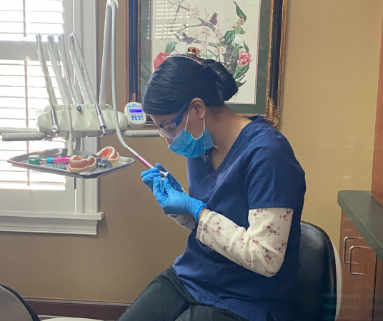 Dental assistant student training at Madison Dental Assistant School