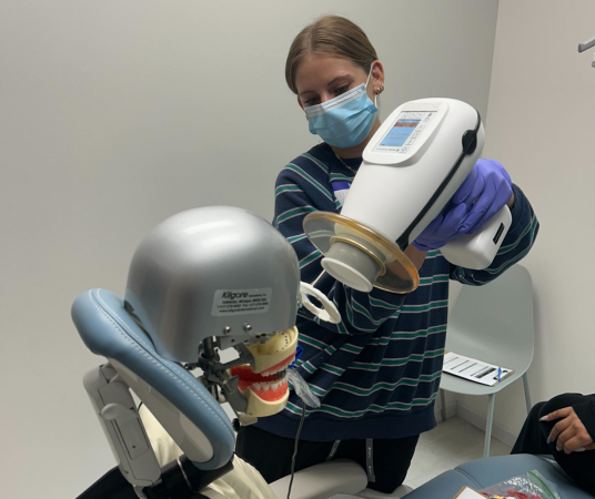 Dental assistant student training at Provo Dental Assistant School