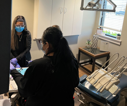 Dental assistant student training at Dallas Dental Assistant School