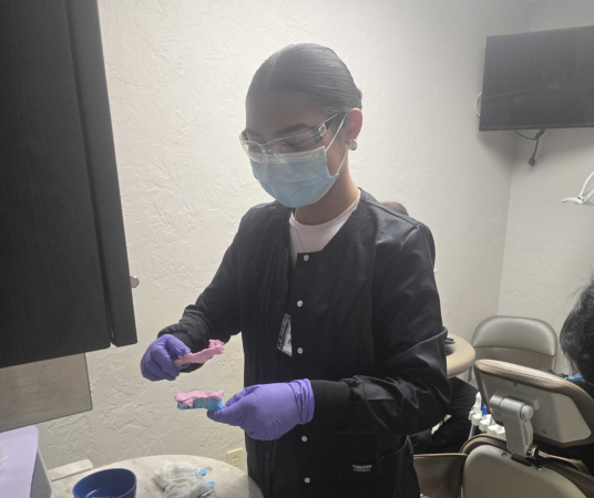 Dental assistant student training at Fort Wayne Dental Assistant School